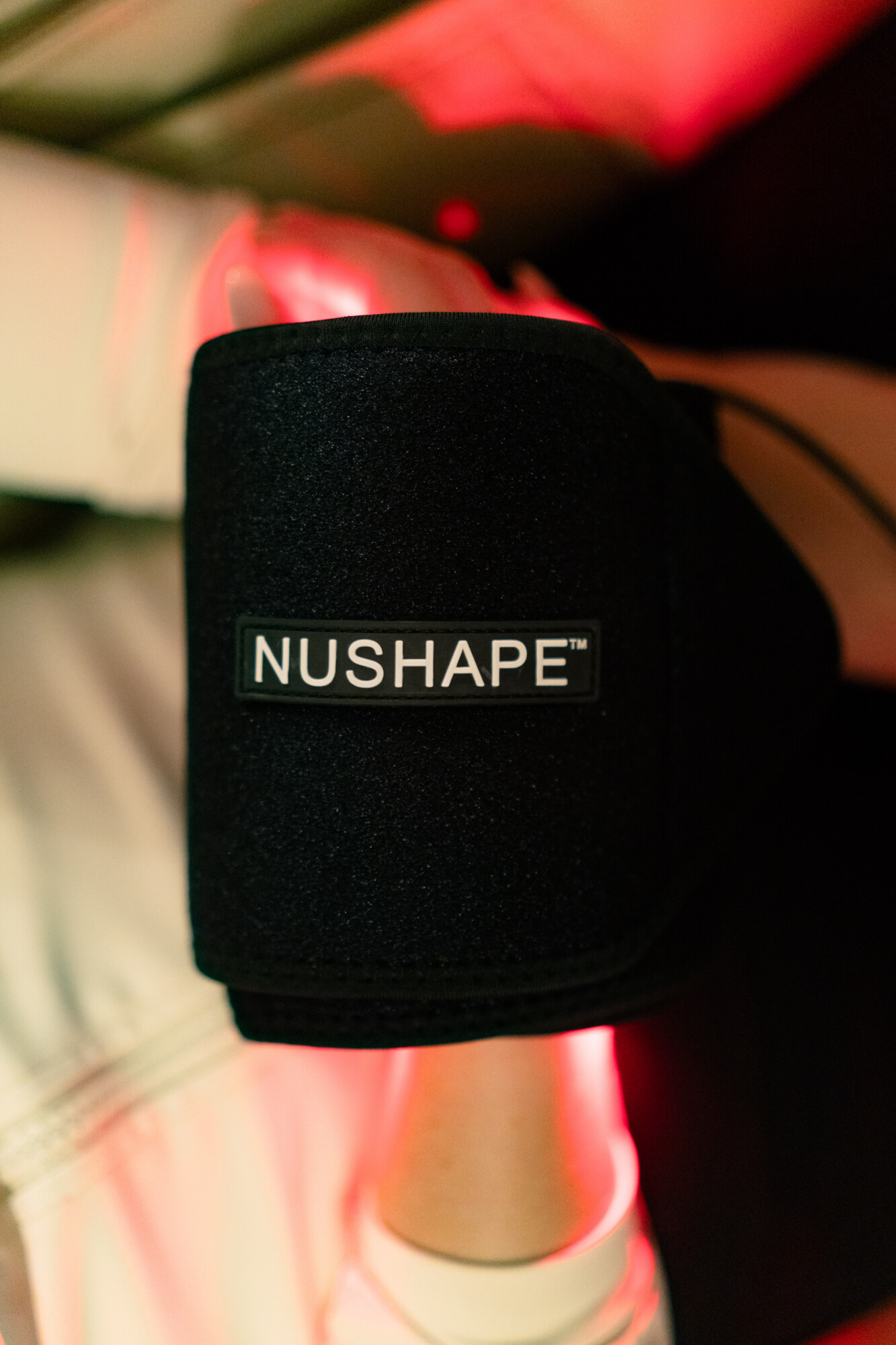 Nushape red light therapy joint wrap at Unwind Massage Lounge Dallas
