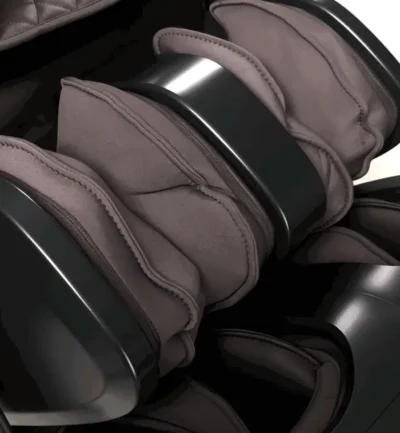 Close-up of massage chair's padded rollers.